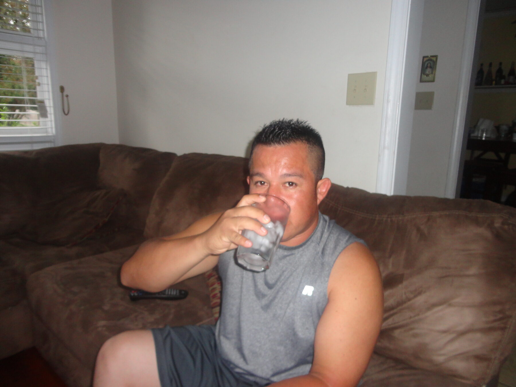 Homero relaxing on a couch