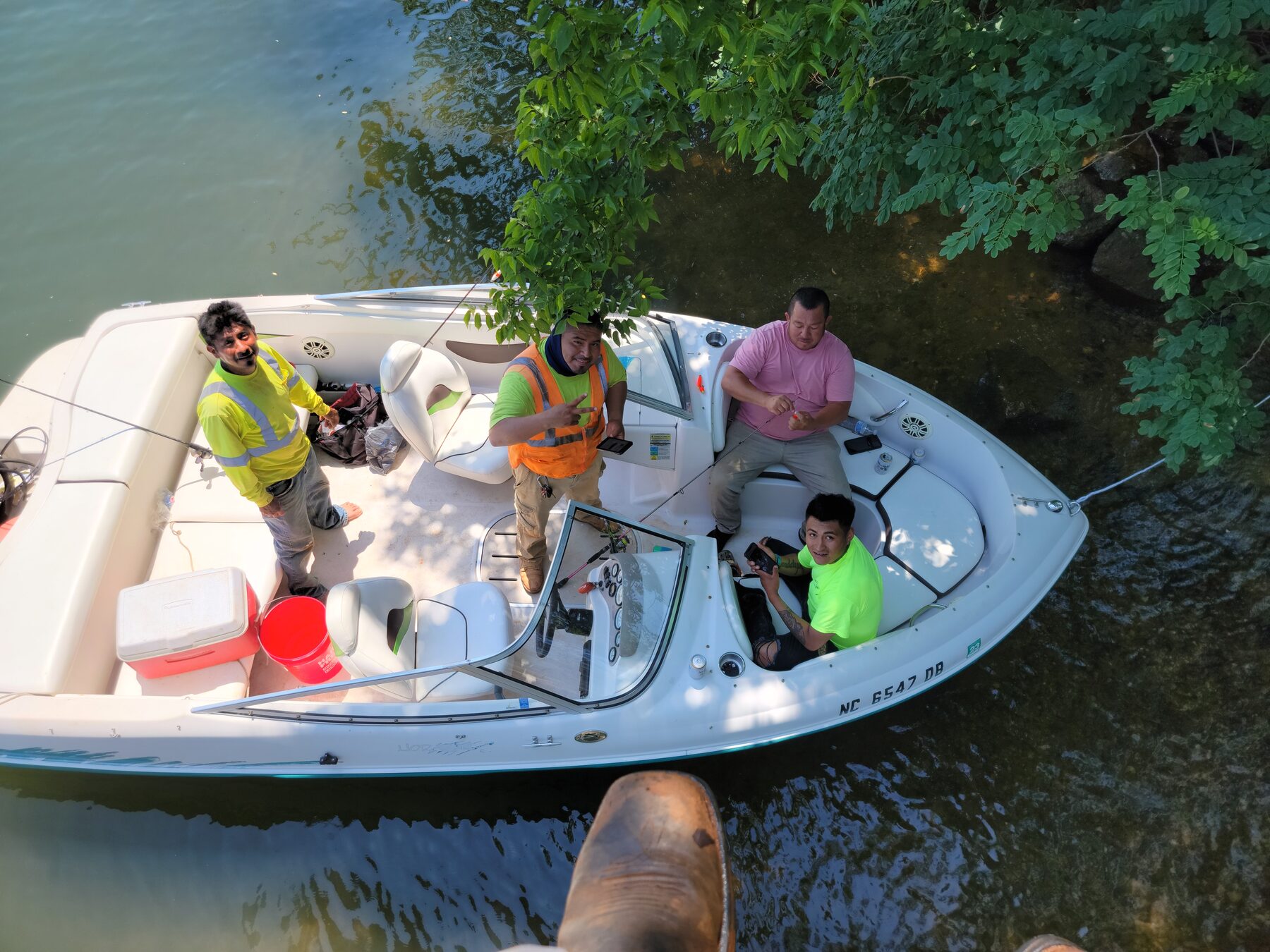 Homero and family riding in a boat