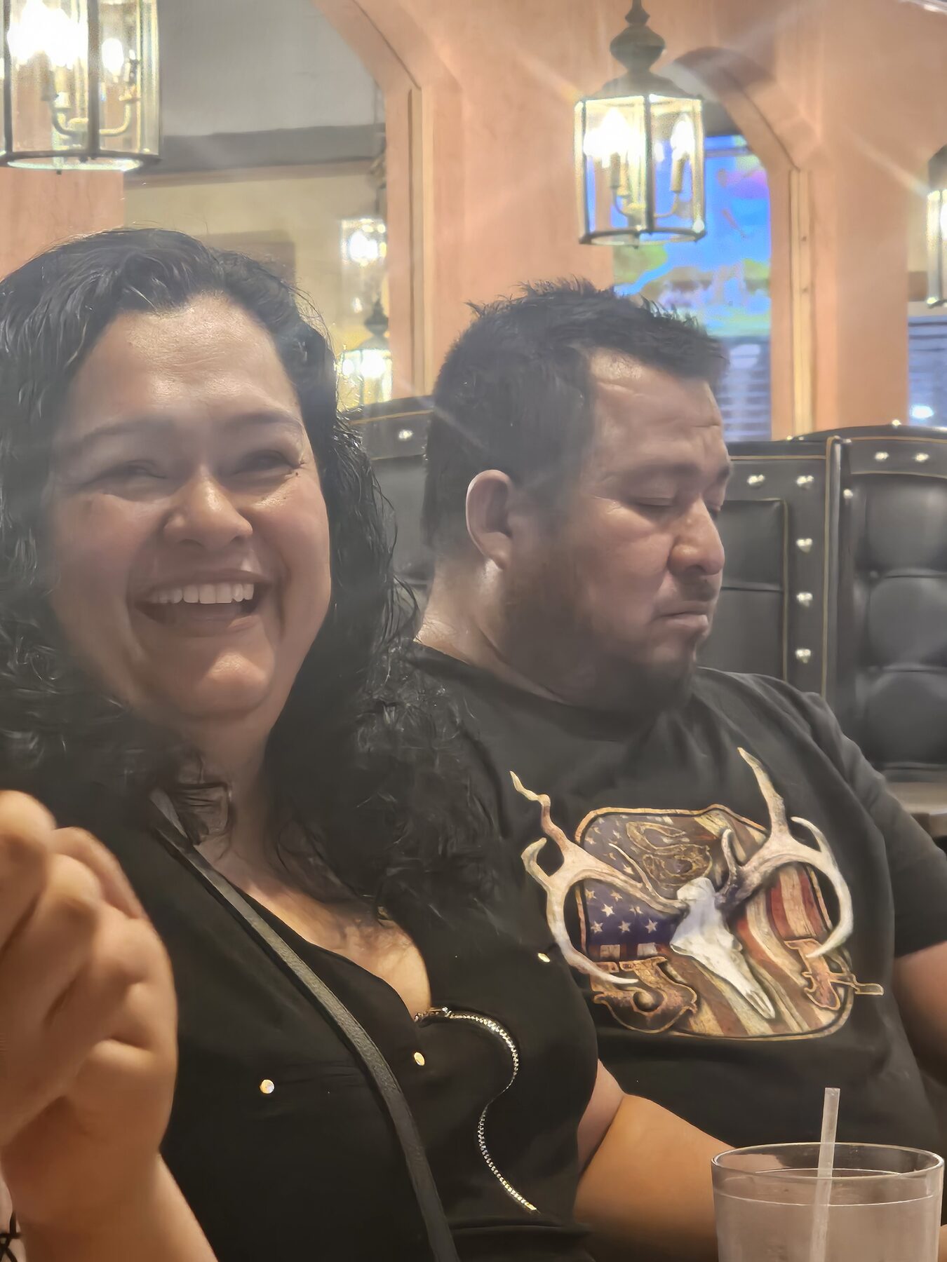 Homero sitting at a table during a night out