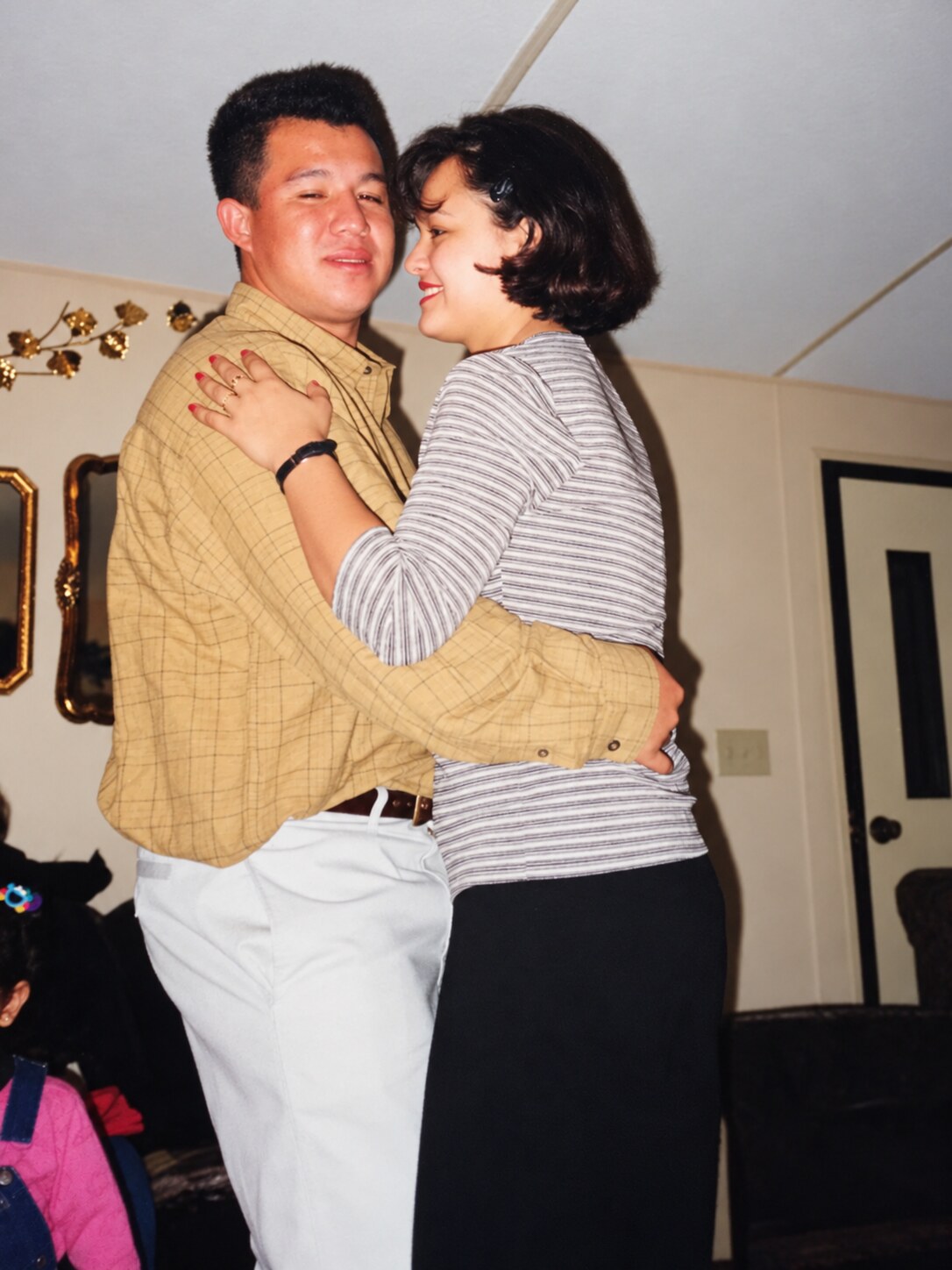 My dad and my mom dancing together at Christmas
