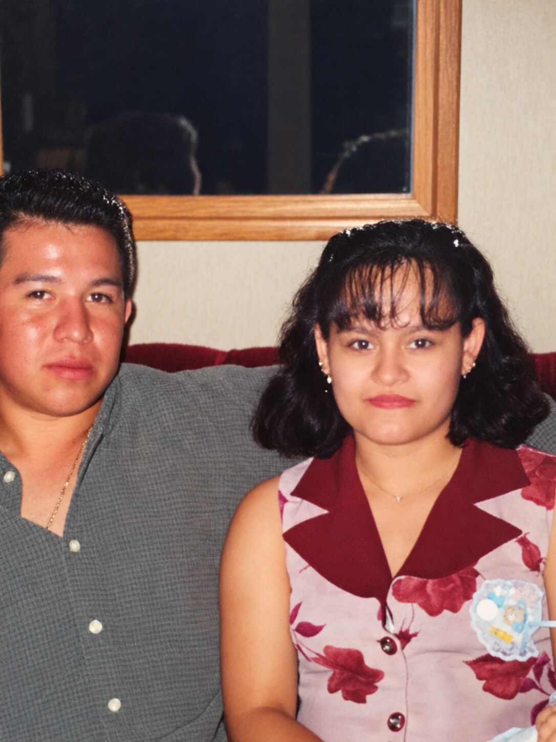 My dad and my mom posing together at my baby shower
