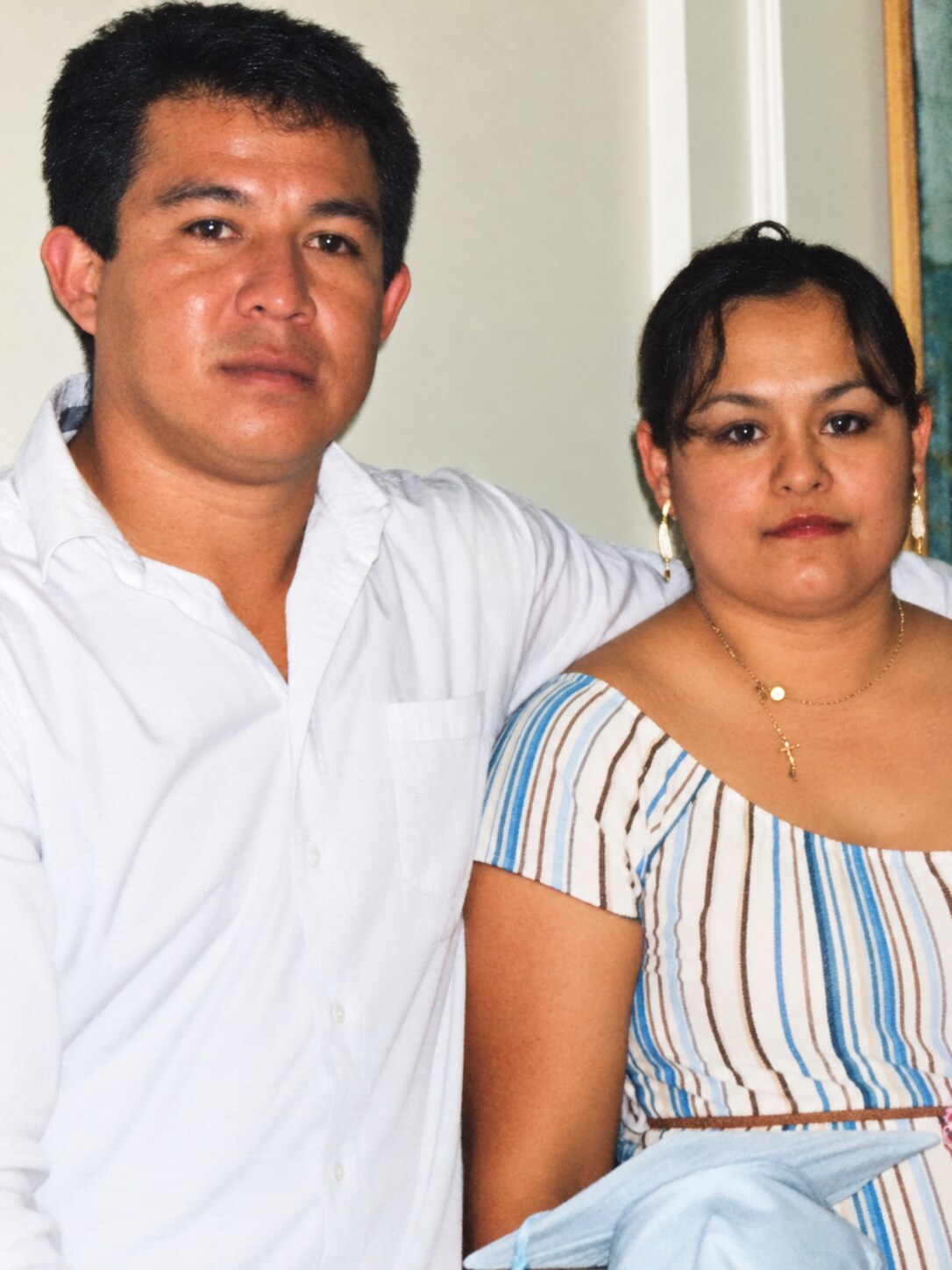My dad and my mom posing together for a portrait