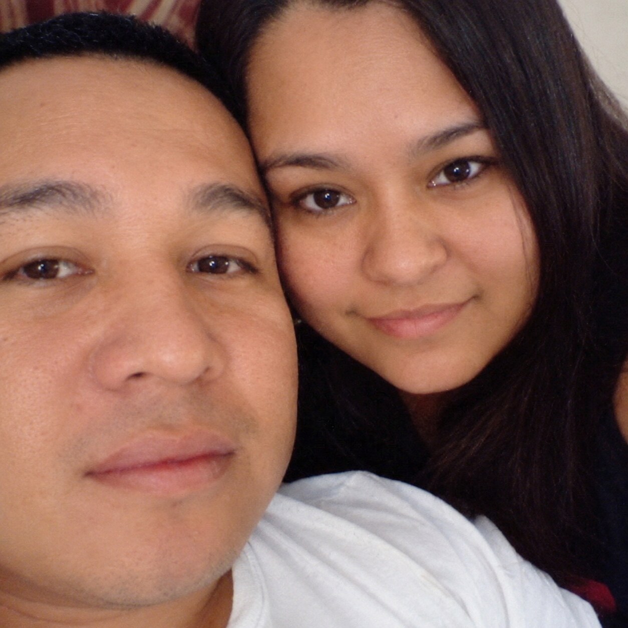 A close selfie of my dad and my mom
