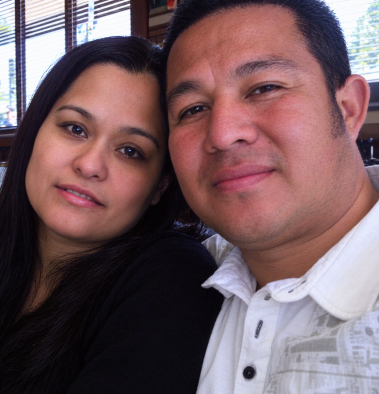 A close selfie of my dad and my mom